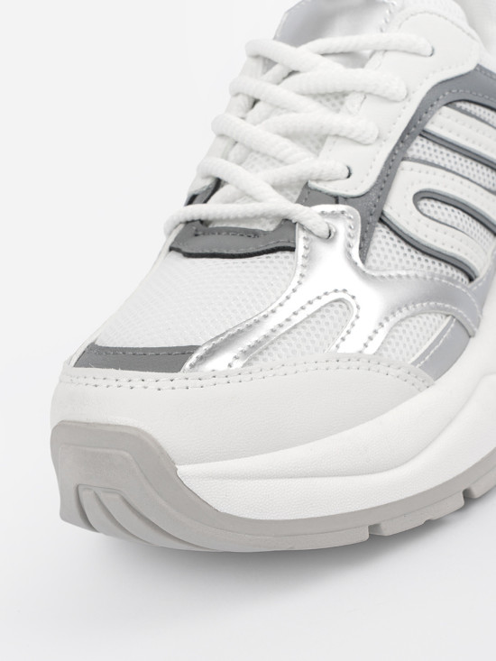 Białe damskie sneakersy ze srebrnymi wstawkami