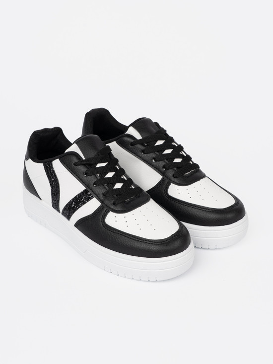 Stylowe czarno-białe sneakersy z brokatowymi wstawkami