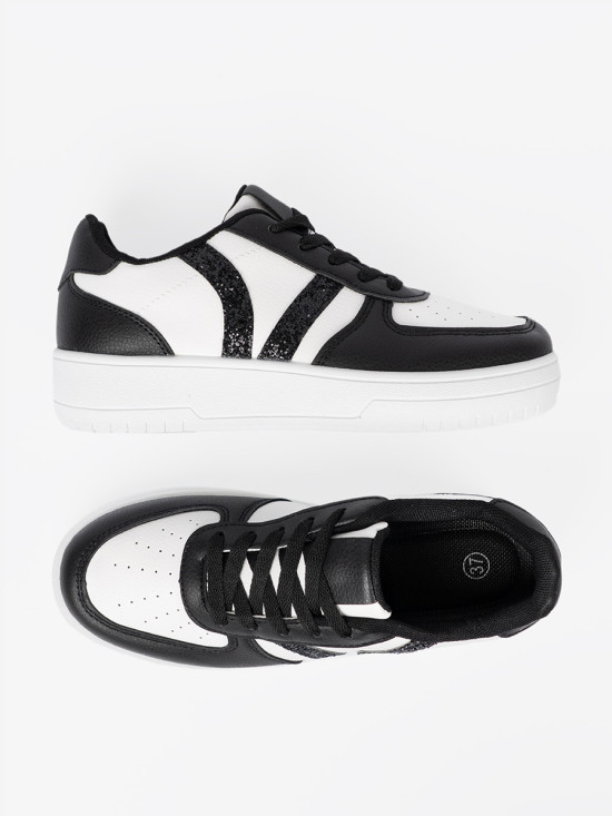 Stylowe czarno-białe sneakersy z brokatowymi wstawkami