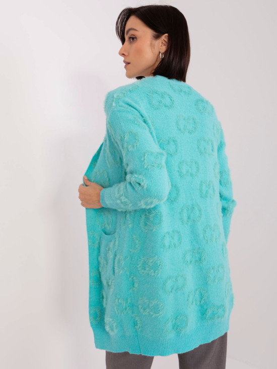 Miętowy kardigan we wzory