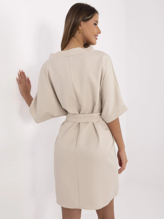 Elegancka beżowa sukienka koktajlowa