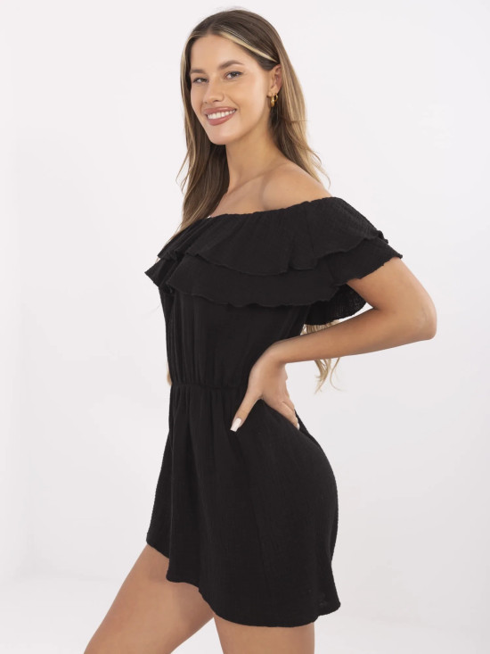 Stylowy czarny kombinezon z falbanami