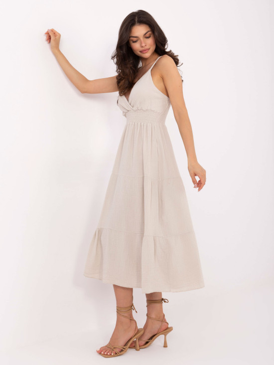 Béżowa rozklasna sukienka z falbanami