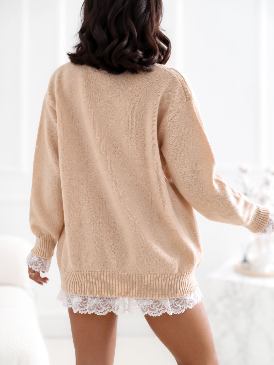 Beżowy elegancki sweter z koronką i wiązaniem
