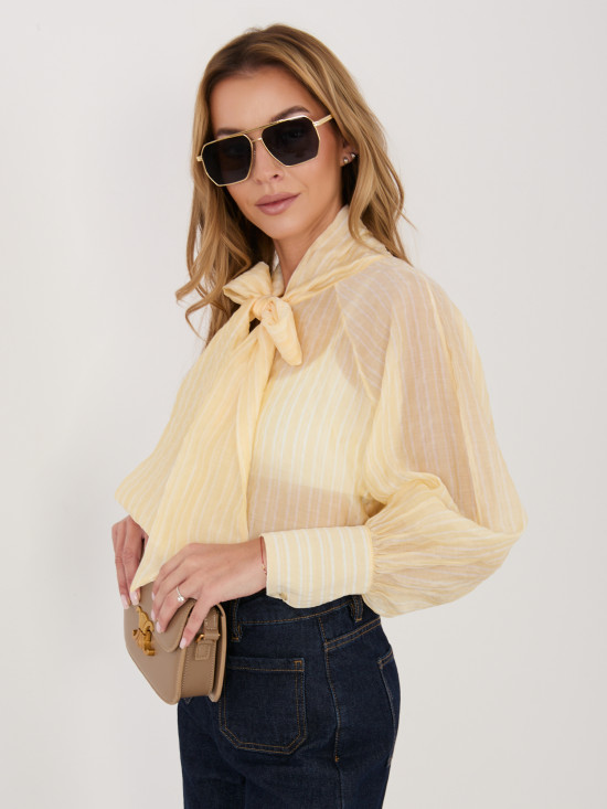 Jasnożółta koszula w paski z wiązaniem