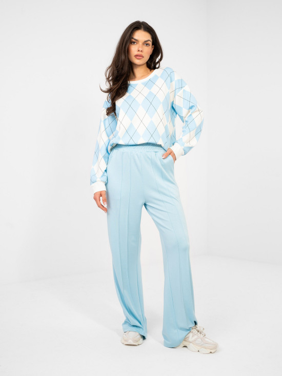 Damskie szerokie spodnie dresowe w jasnoniebieskim kolorze
