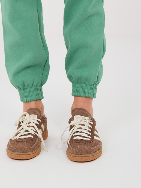 Pistacjowe spodnie dresowe z wysokim stanem