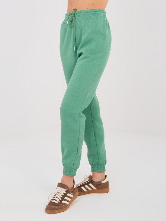 Pistacjowe spodnie dresowe z wysokim stanem