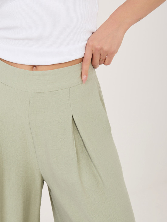 Pistacjowe spodnie palazzo z wiskozy