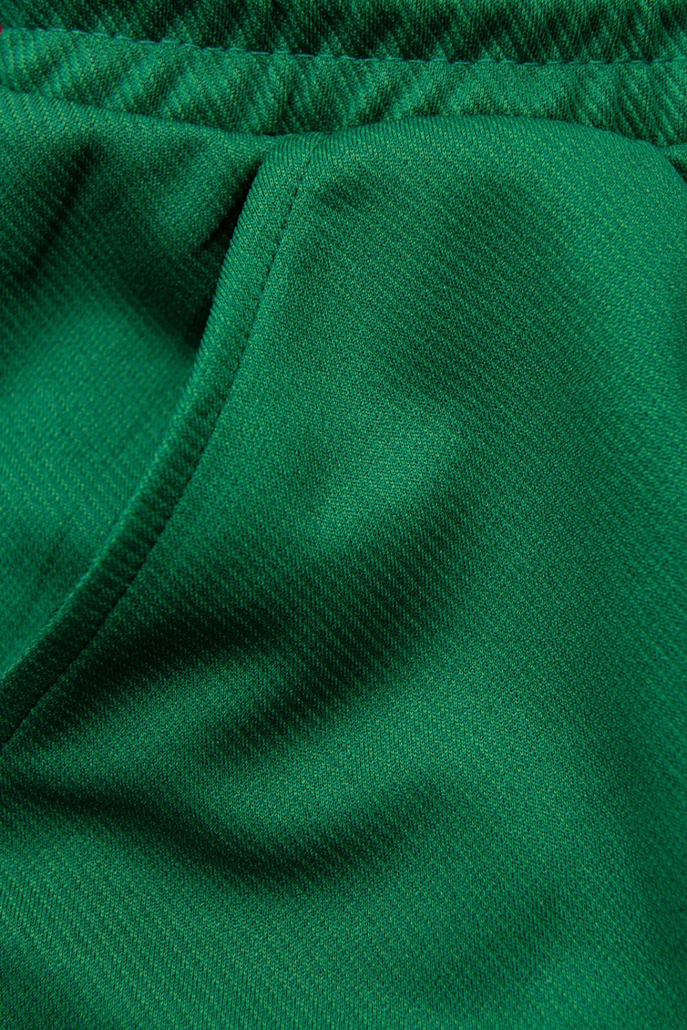 Zielone sportowe spodnie z kieszeniami