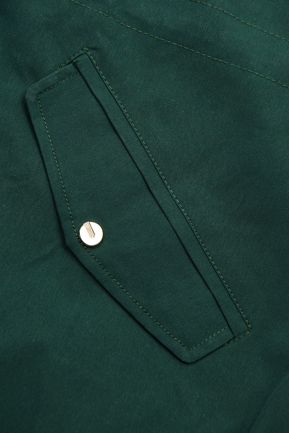 Ciemnozielona parka w kropki