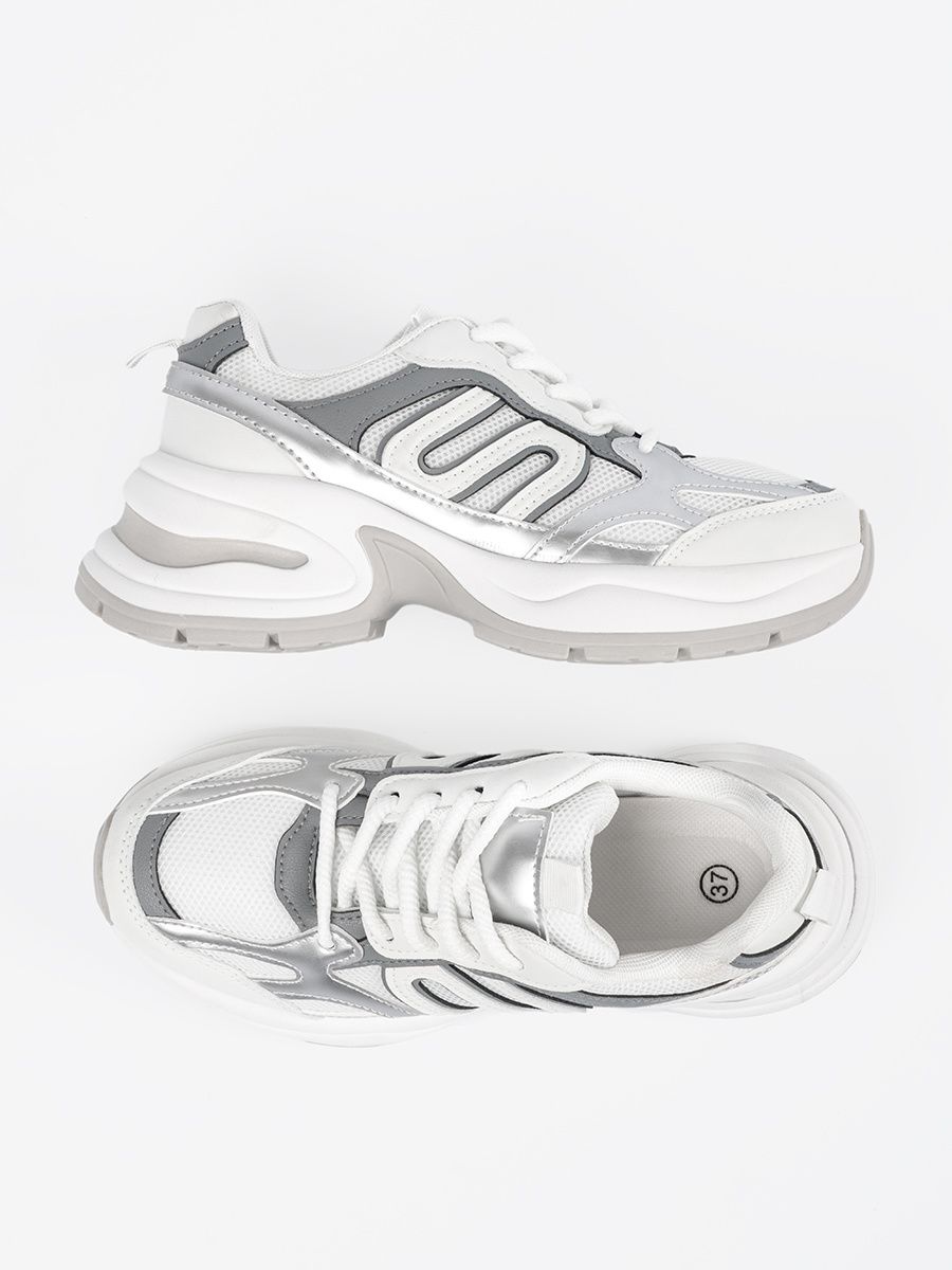 Białe damskie sneakersy ze srebrnymi wstawkami