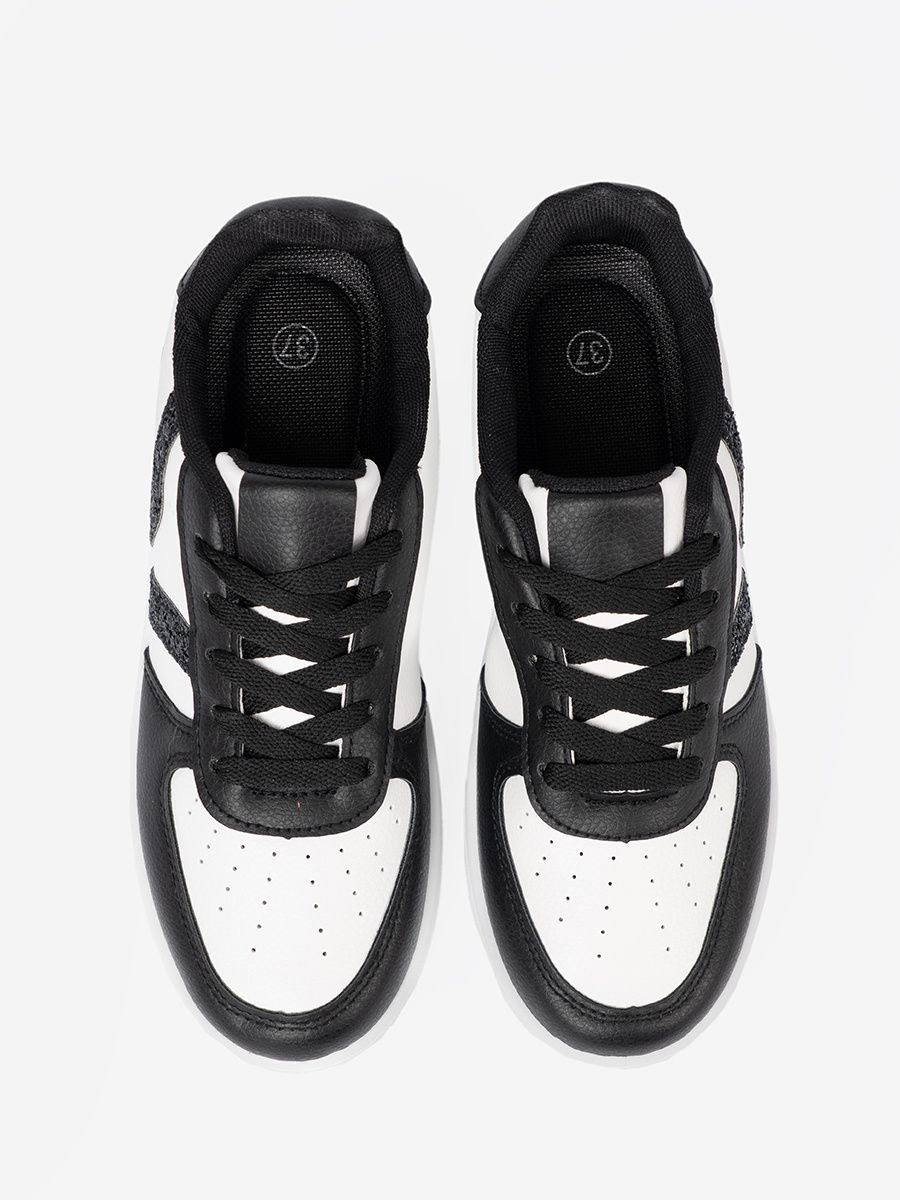 Stylowe czarno-białe sneakersy z brokatowymi wstawkami