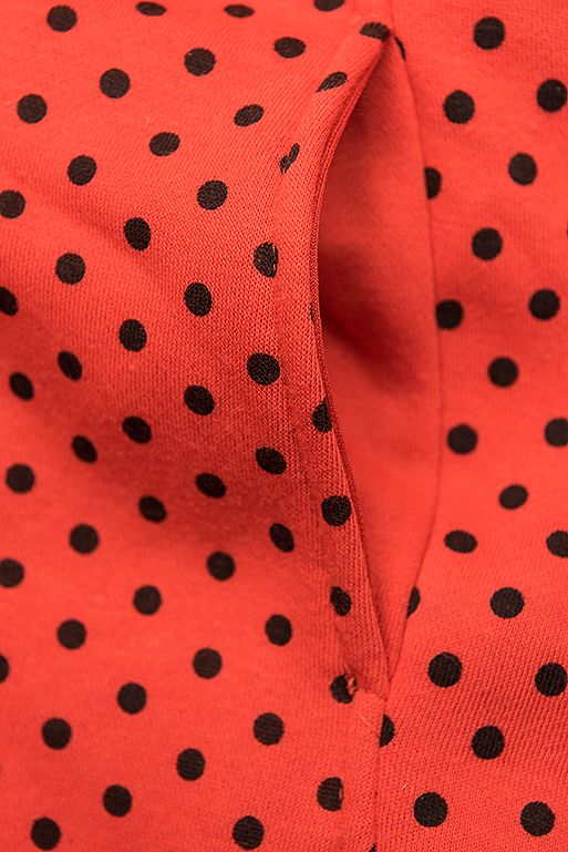 Pomarańczowa długa bluza w kropki