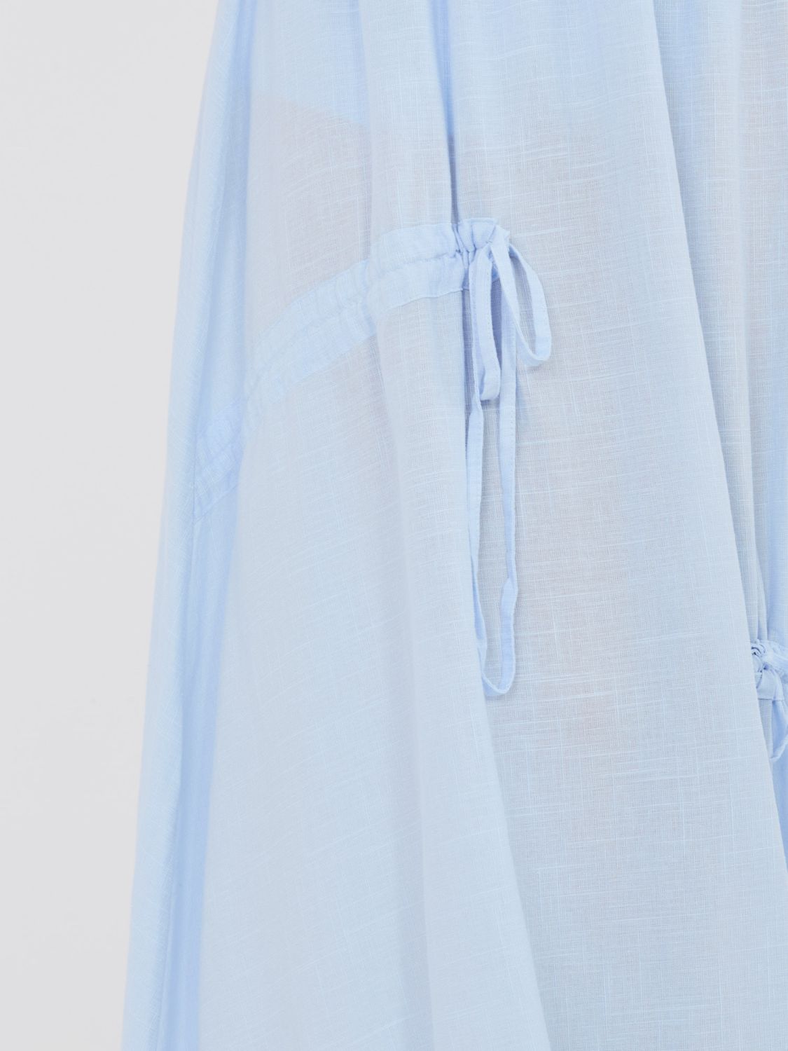 Jasnoniebieska spódnica midi z wiązaniem