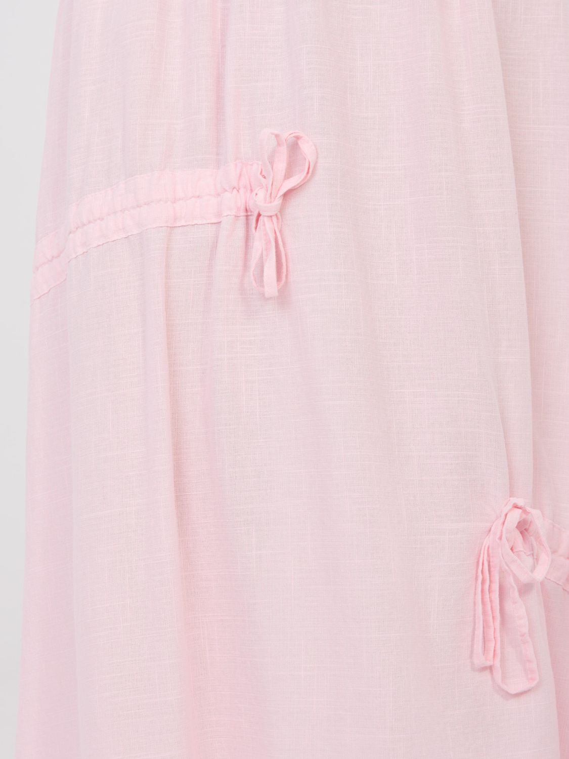 Jasnoróżowa spódnica midi z wiązaniem