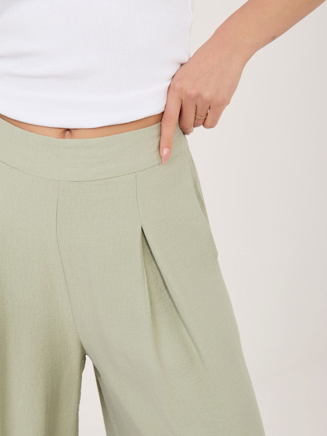 Pistacjowe spodnie palazzo z wiskozy