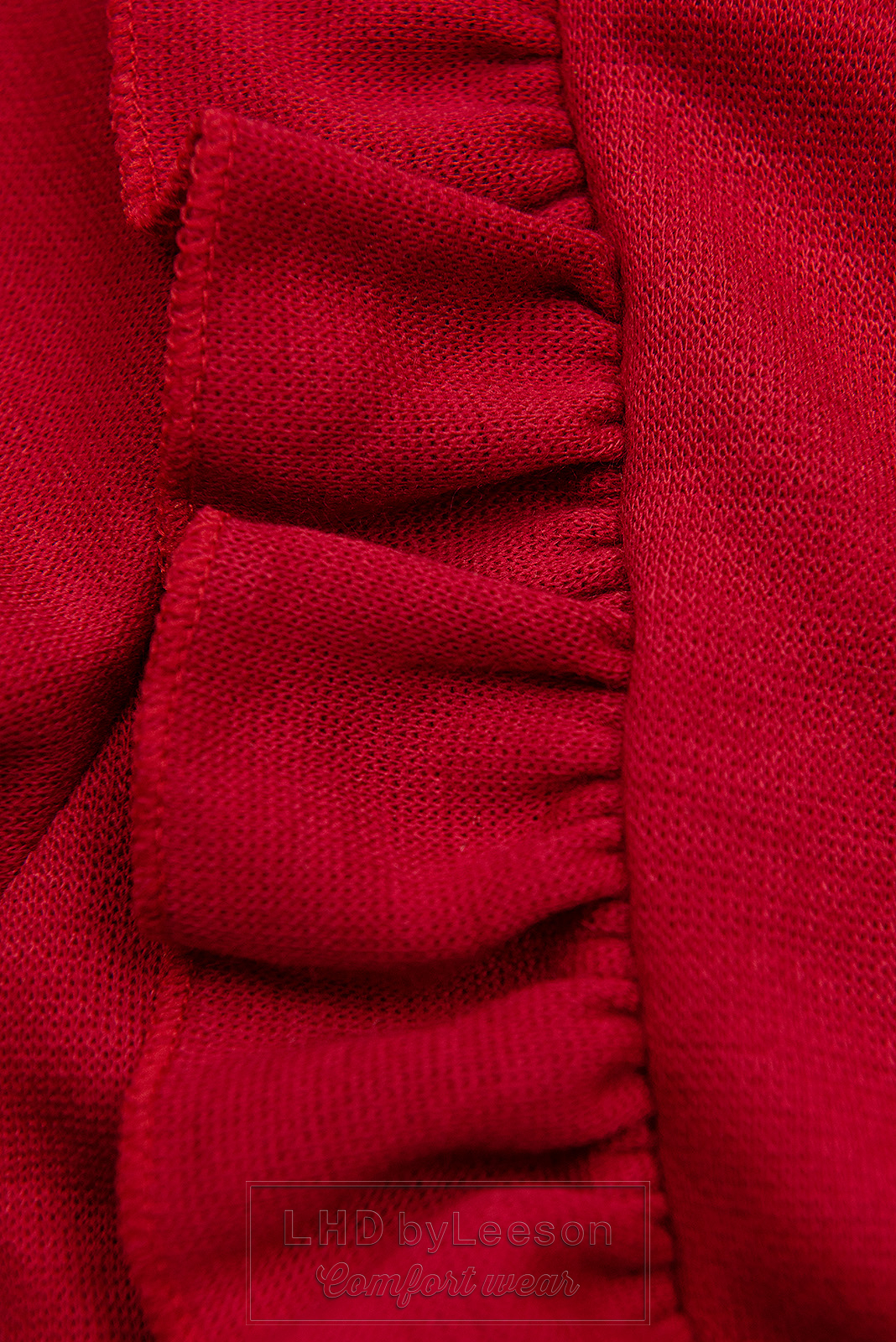 Czerwona sukienka ze skórzaną plisowaną spódnicą