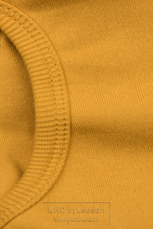 Żółta wydłużona bluza w slim fasonie