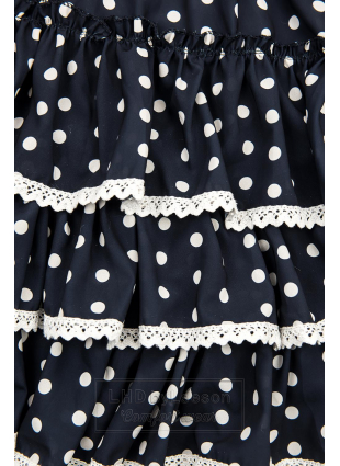 Granatowa sukienka w kropki z falbankami