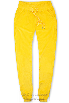 Żółte spodnie z troczkami w pasie