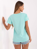 Miętowy t-shirt z napisem