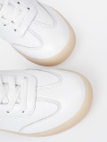 Białe damskie sneakersy
