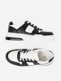 Stylowe czarno-białe sneakersy z grubą podeszwą