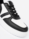 Stylowe czarno-białe sneakersy z brokatowymi wstawkami