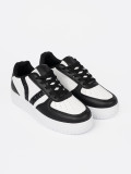 Stylowe czarno-białe sneakersy z brokatowymi wstawkami