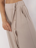 Elegancka midi spódnica w beżowym kolorze