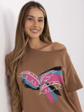 Stylowe t-shirt z aplikacją w jasnym beżu