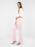 Stylowe różowe spodnie dresowe z wysokim stanem i szeroką nogawką