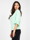 Elegancki miętowy sweter z falbaną i rękawem 3/4