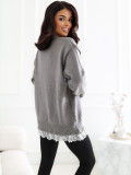 Elegancki szary sweter z koronką i wiązaniem