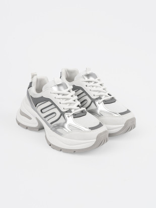 Białe damskie sneakersy ze srebrnymi wstawkami
