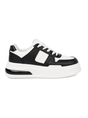 Stylowe czarno-białe sneakersy z grubą podeszwą