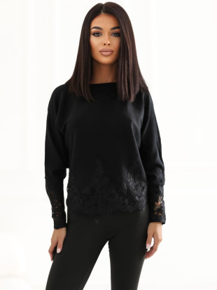 Elegancki czarny sweter z koronką