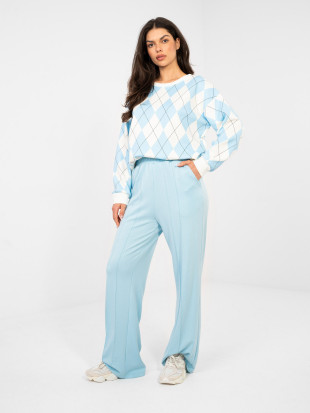 Damskie szerokie spodnie dresowe w jasnoniebieskim kolorze