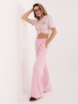 Jasnoróżowe szerokie spodnie dresowe
